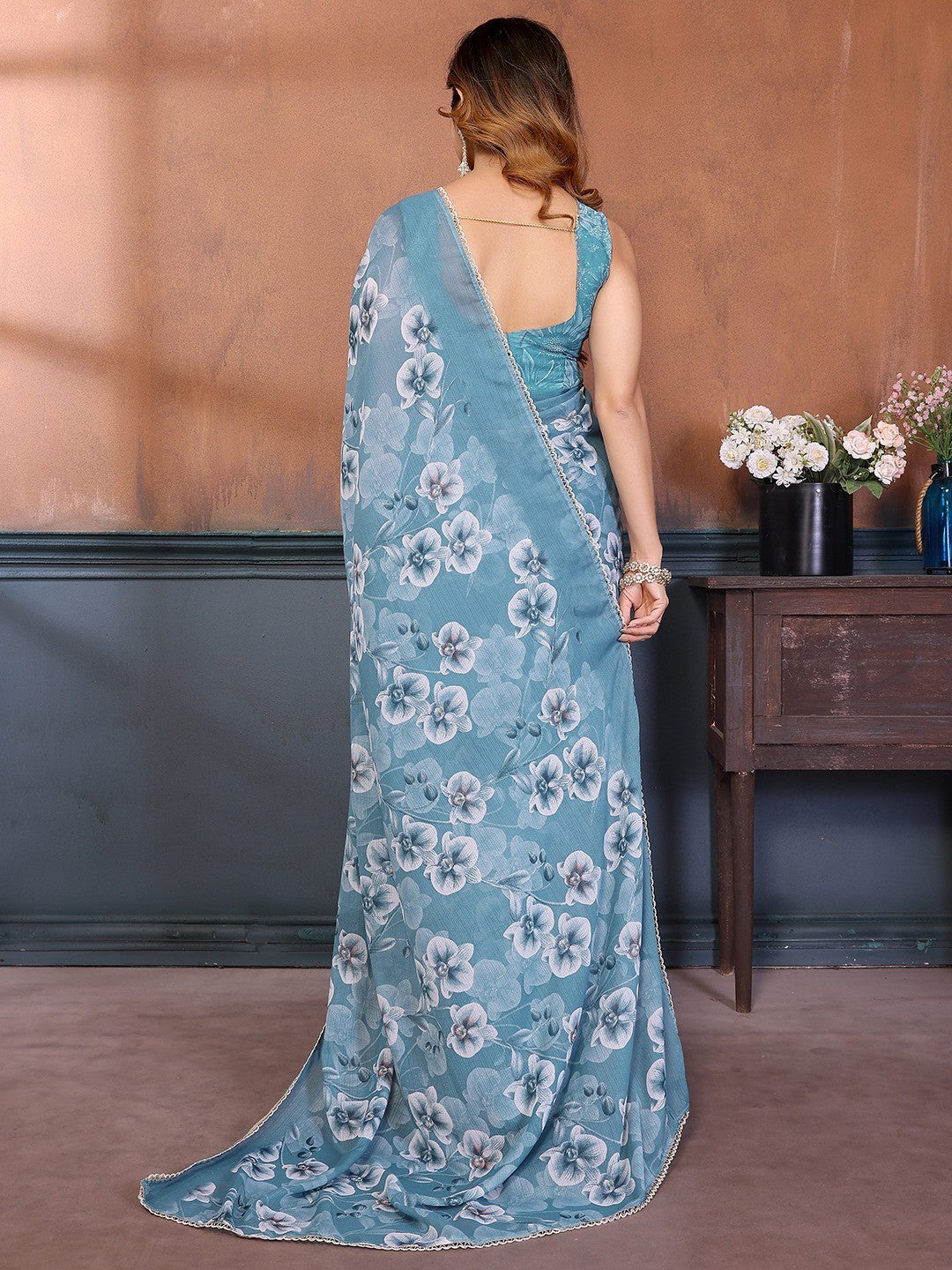 Elegant Sky Blue Floral Printed Georgette Saree Enhanced With Delicate Lace Border Work - Image 6
