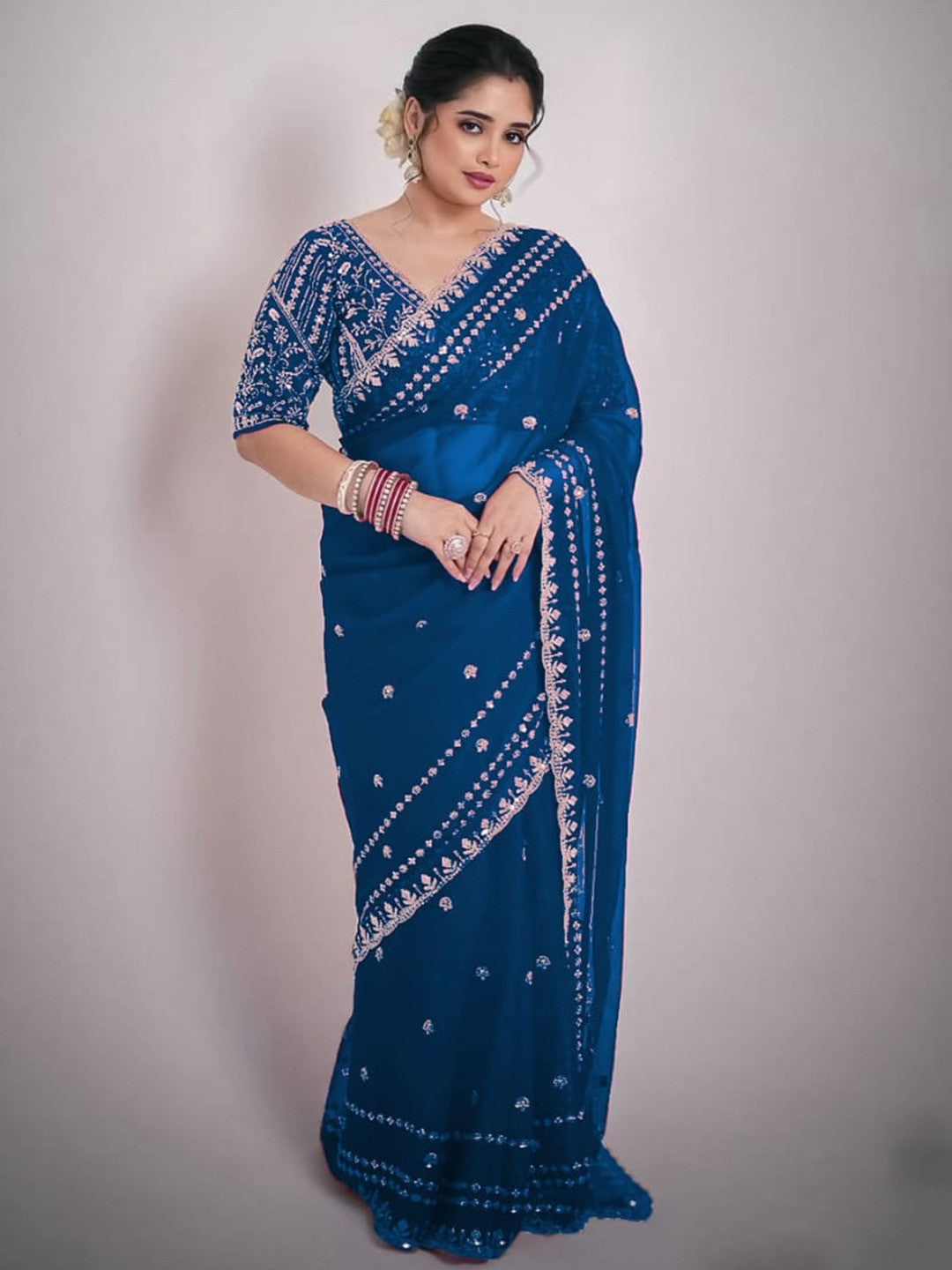 Luxurious Blue Floral Zari Embroidered Satin Saree Accented With Fine Sequins Work - Image 1