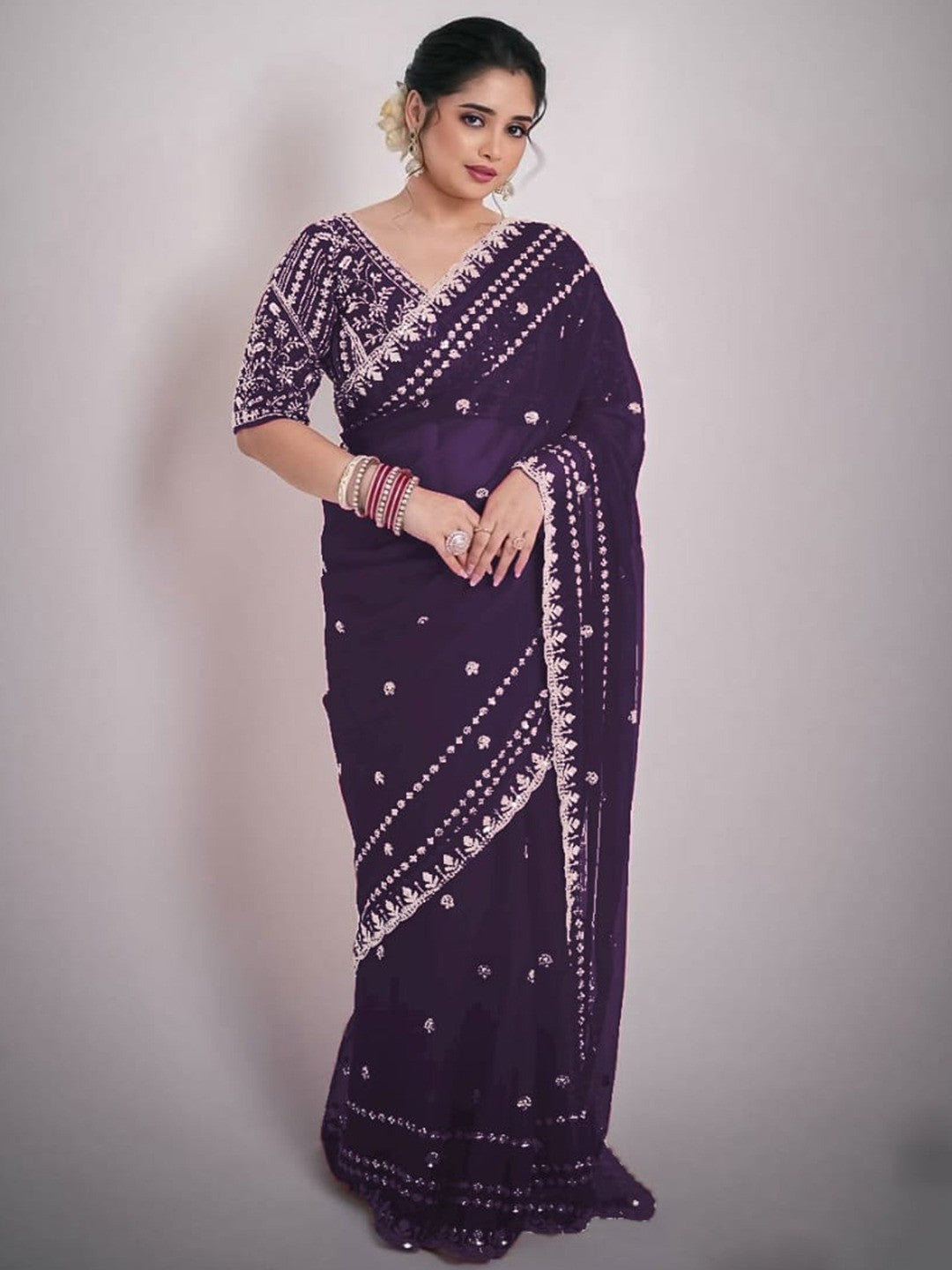 Luxurious Purple Floral Zari Embroidered Satin Saree Accented With Fine Sequins Work - Image 1
