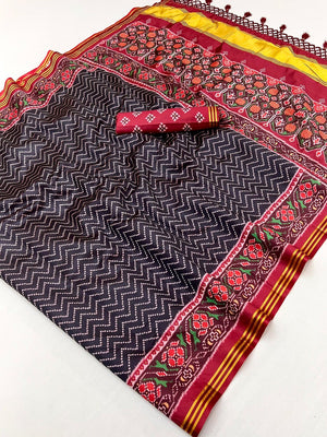Traditional Black Patola Print Handloom Silk Saree with Pallu Tassel Detailing - Image 2