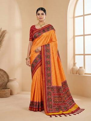 Traditional Orange Patola Print Handloom Silk Saree with Pallu Tassel Detailing - Image 1