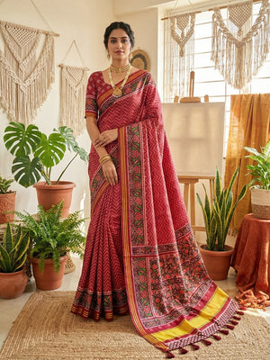Traditional Maroon Patola Print Handloom Silk Saree with Pallu Tassel Detailing - Image 1