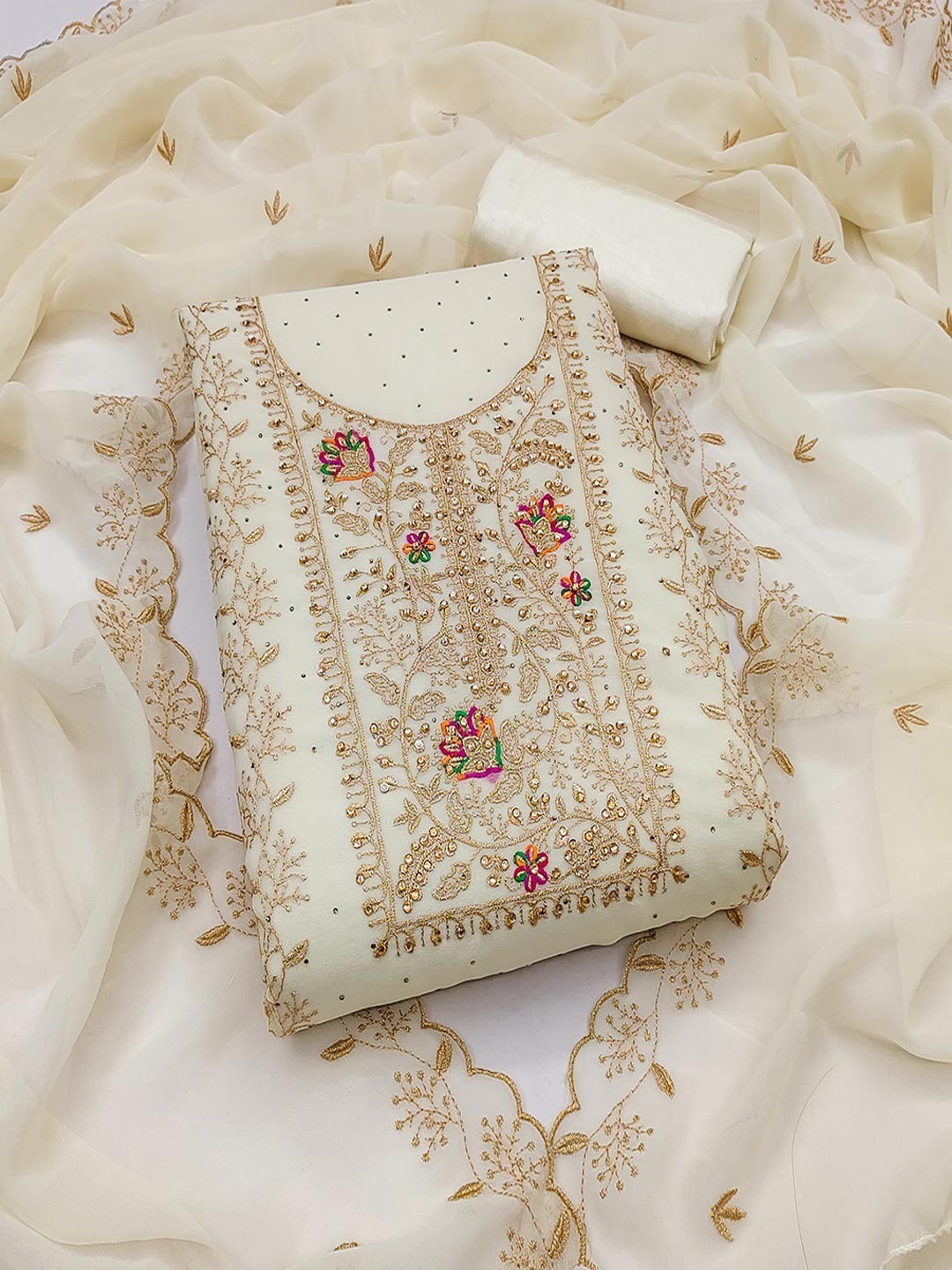 Cream Designer Georgette Dress Material Adorned with Fine Golden Thread Embroidery - Image 1
