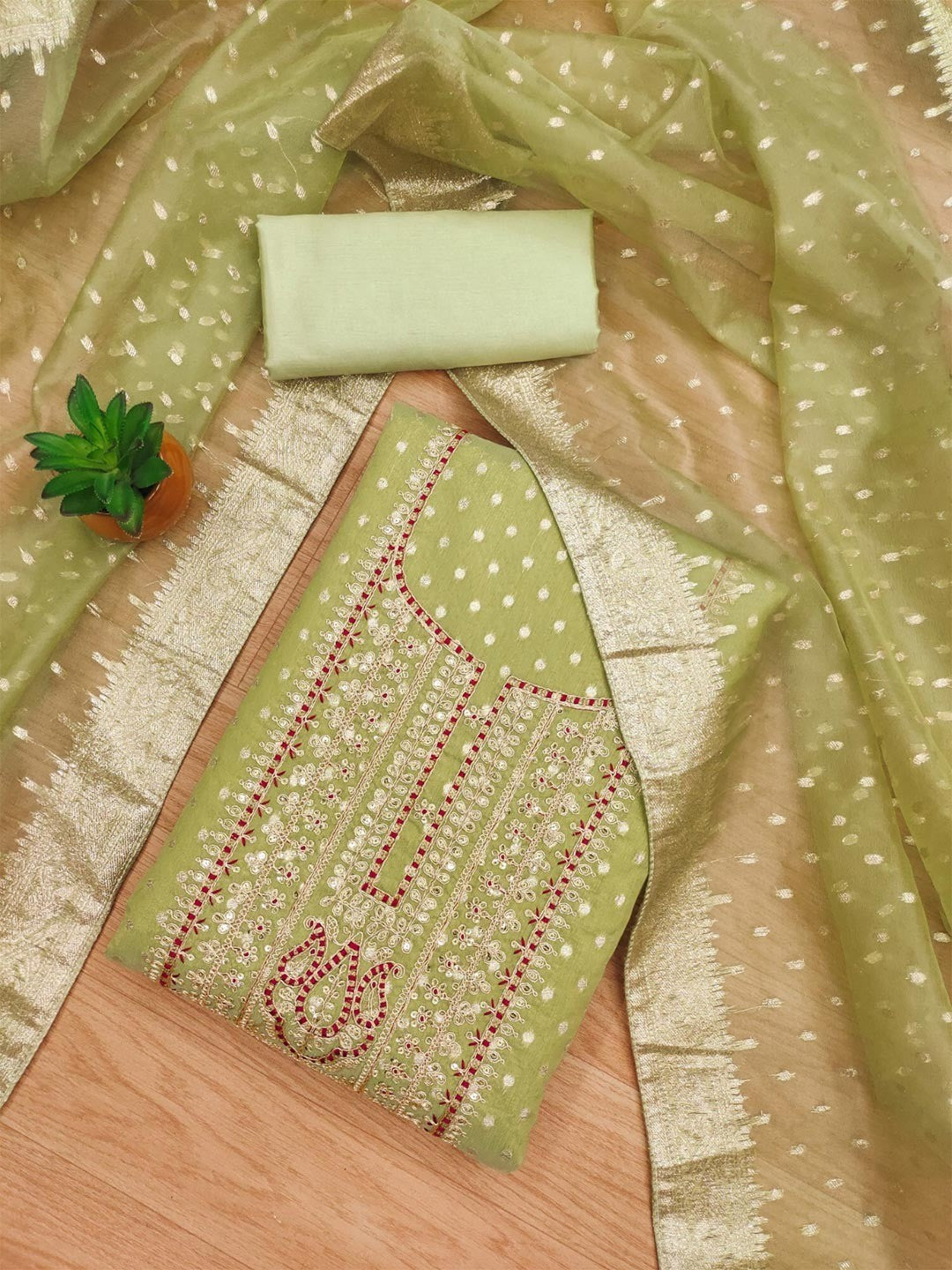 Sophisticated Green Floral Cording Sequins Embroidery With Weaving Shimmer Dress Material - Image 1