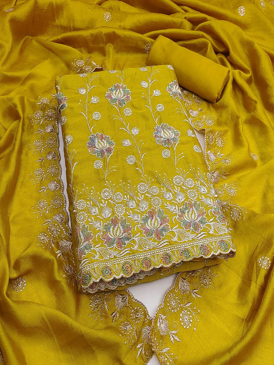 Graceful Mustard Floral Embroidered Vichitra Silk Ethnic Dress Material - Image 1