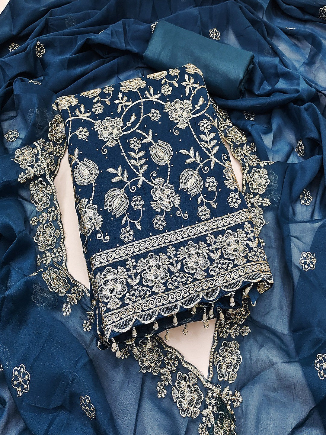 Premium Morpich Blue Floral Zari Embroidery Georgette Dress Material Enhanced With Swarovski Work - Image 1