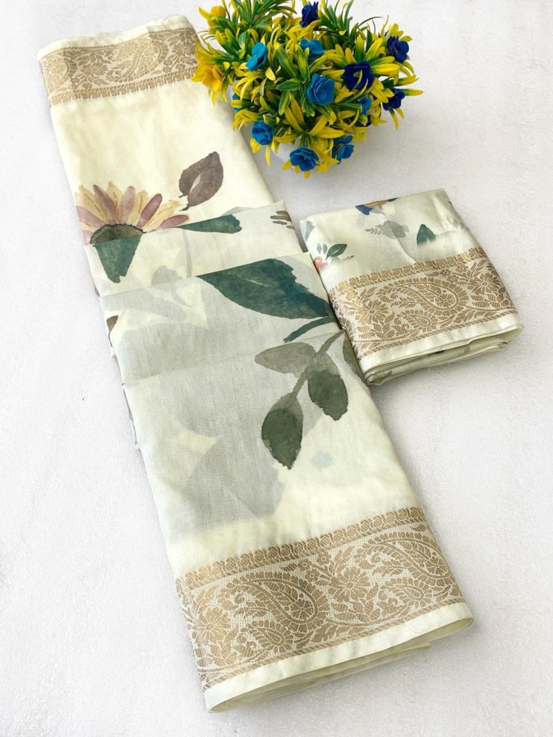 Charming Cream Floral Digital Printed Tussar Dola Silk Saree Enhanced With Luxurious Zari Border - Image 2