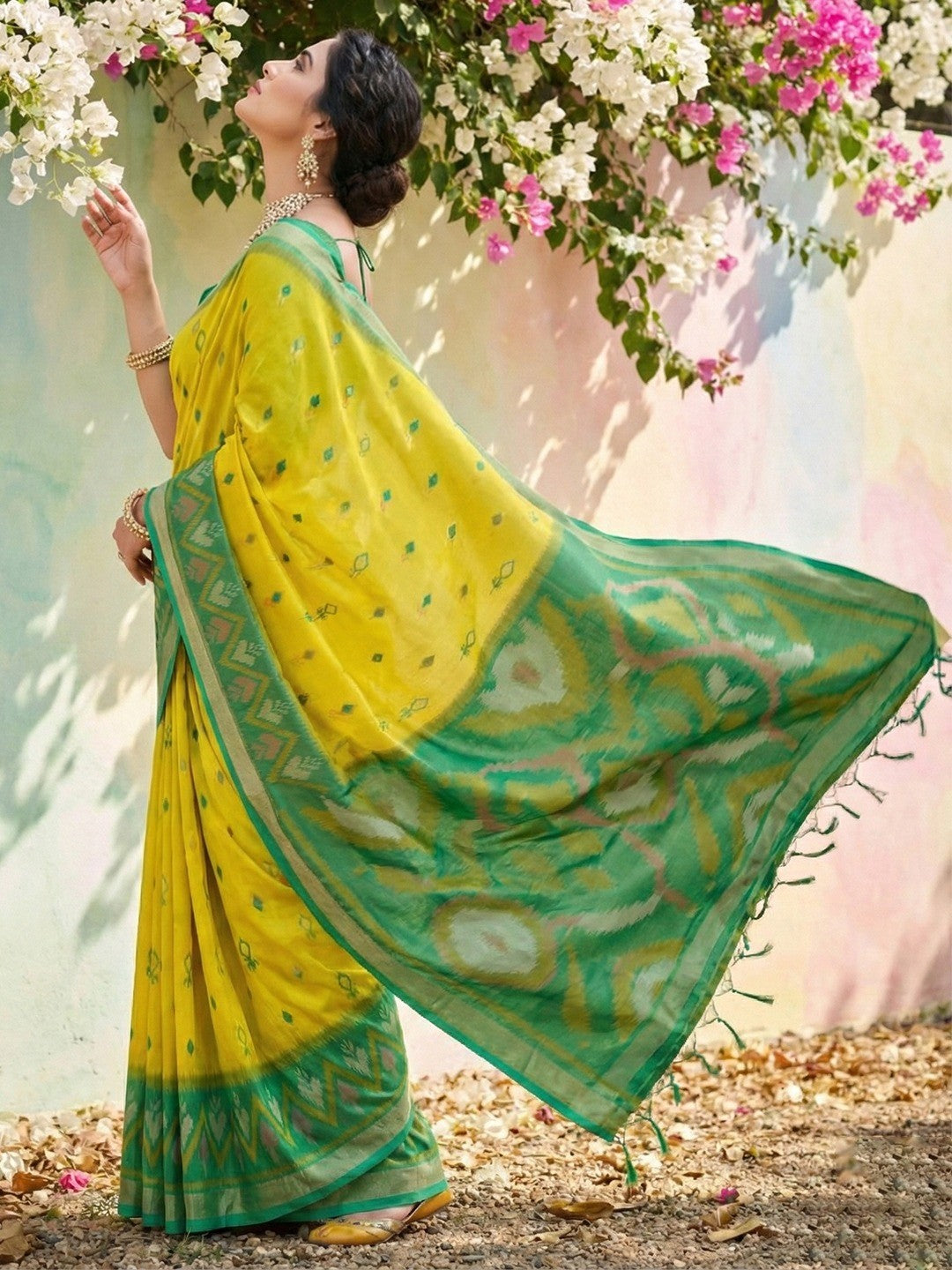 Elegant Lemon Yellow Ikat Woven Silk Blend Saree Featuring A Traditional Motif Pallu With Tassel Accents - Image 3