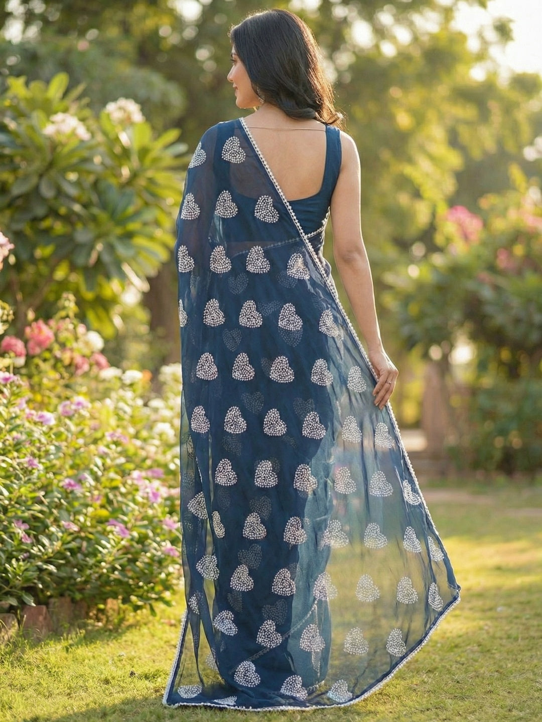 Blue Chiffon Saree Featuring Beautiful Heart Embroidered Detailing and Flowing Drape - Image 4