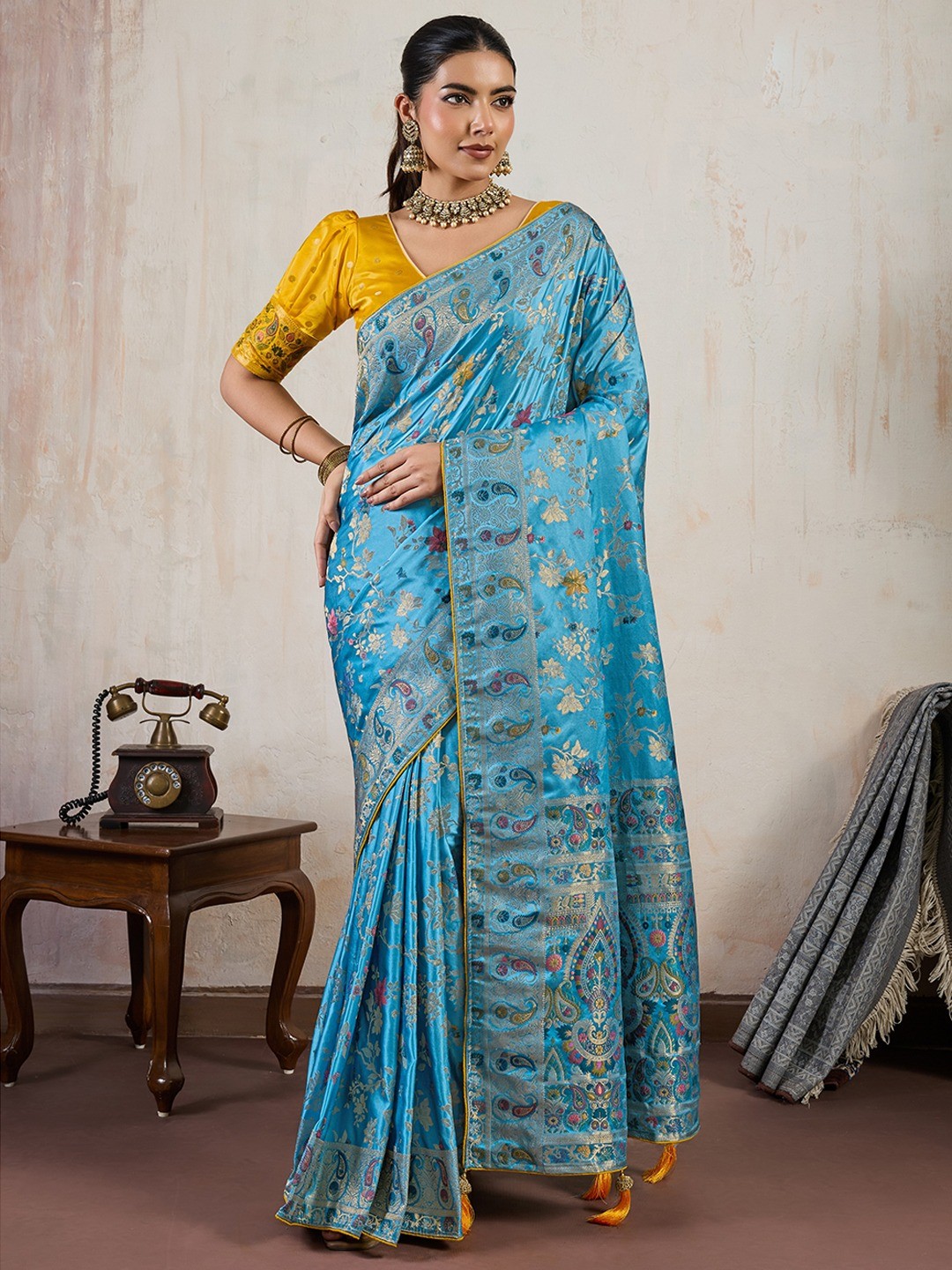 Graceful Aqua Blue Floral Meenakari Weaving Satin Pashmeena Saree Delicate Finish Piping & Tassels - Image 1