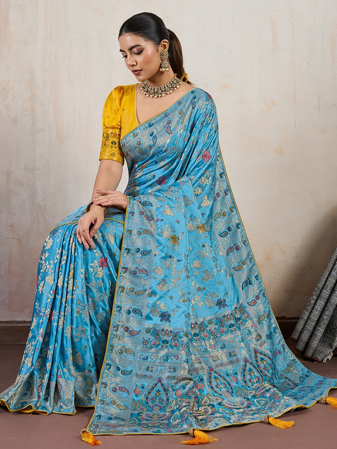 Graceful Aqua Blue Floral Meenakari Weaving Satin Pashmeena Saree Delicate Finish Piping & Tassels - Image 4