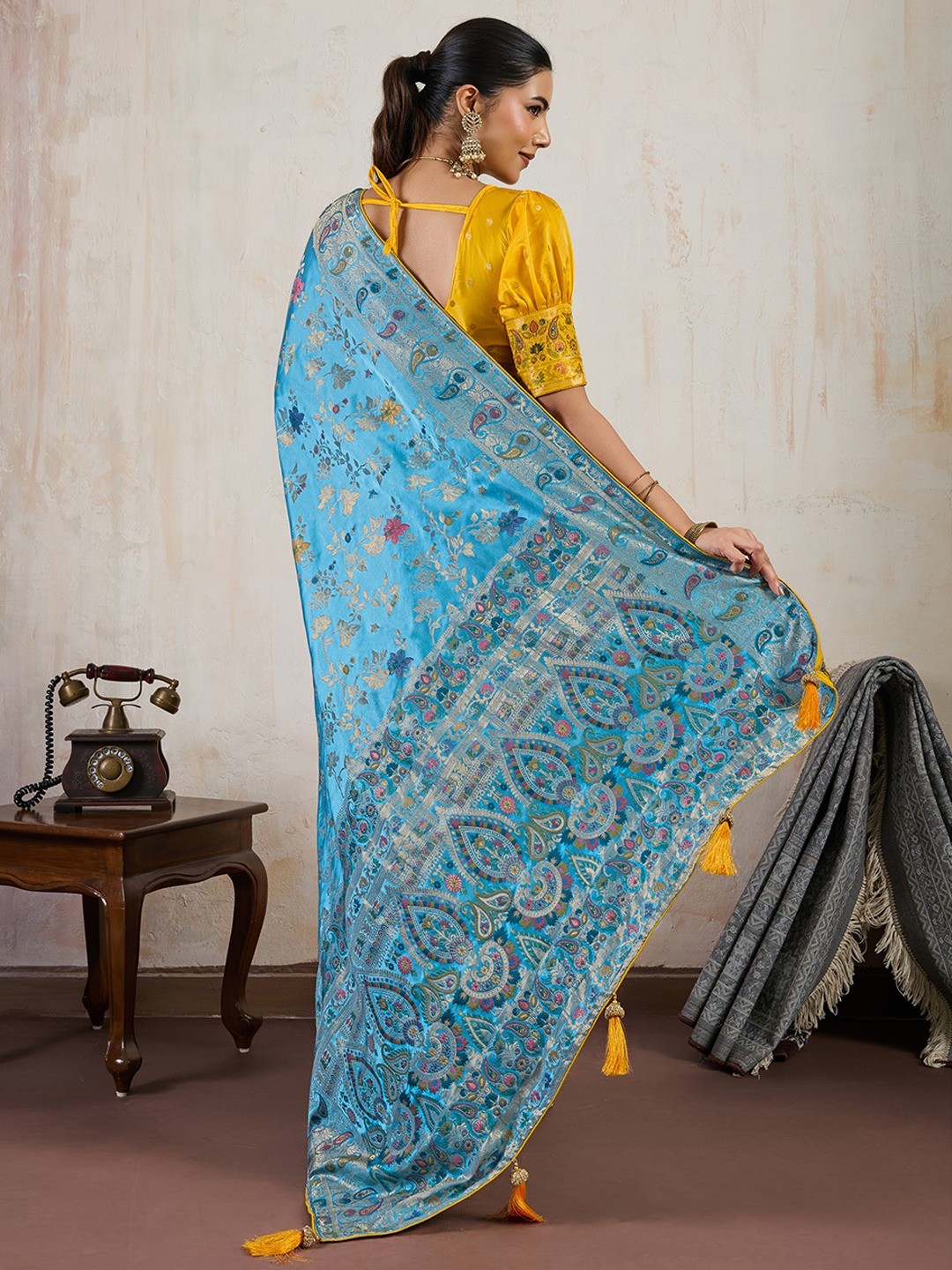 Graceful Aqua Blue Floral Meenakari Weaving Satin Pashmeena Saree Delicate Finish Piping & Tassels - Image 3