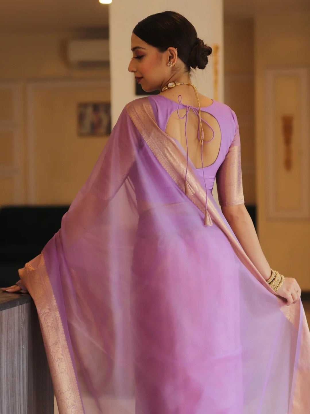 Classic Lavender Solid Organza Saree Featuring Floral Golden Zari Weaving Border - Image 2