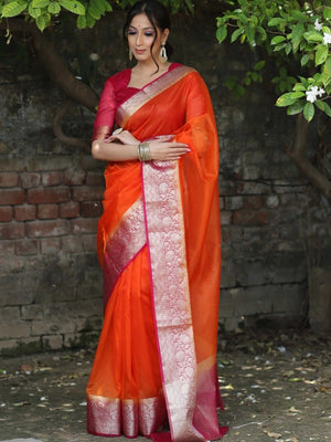 Classic Orange Solid Organza Saree Featuring Floral Golden Zari Weaving Border - Image 1