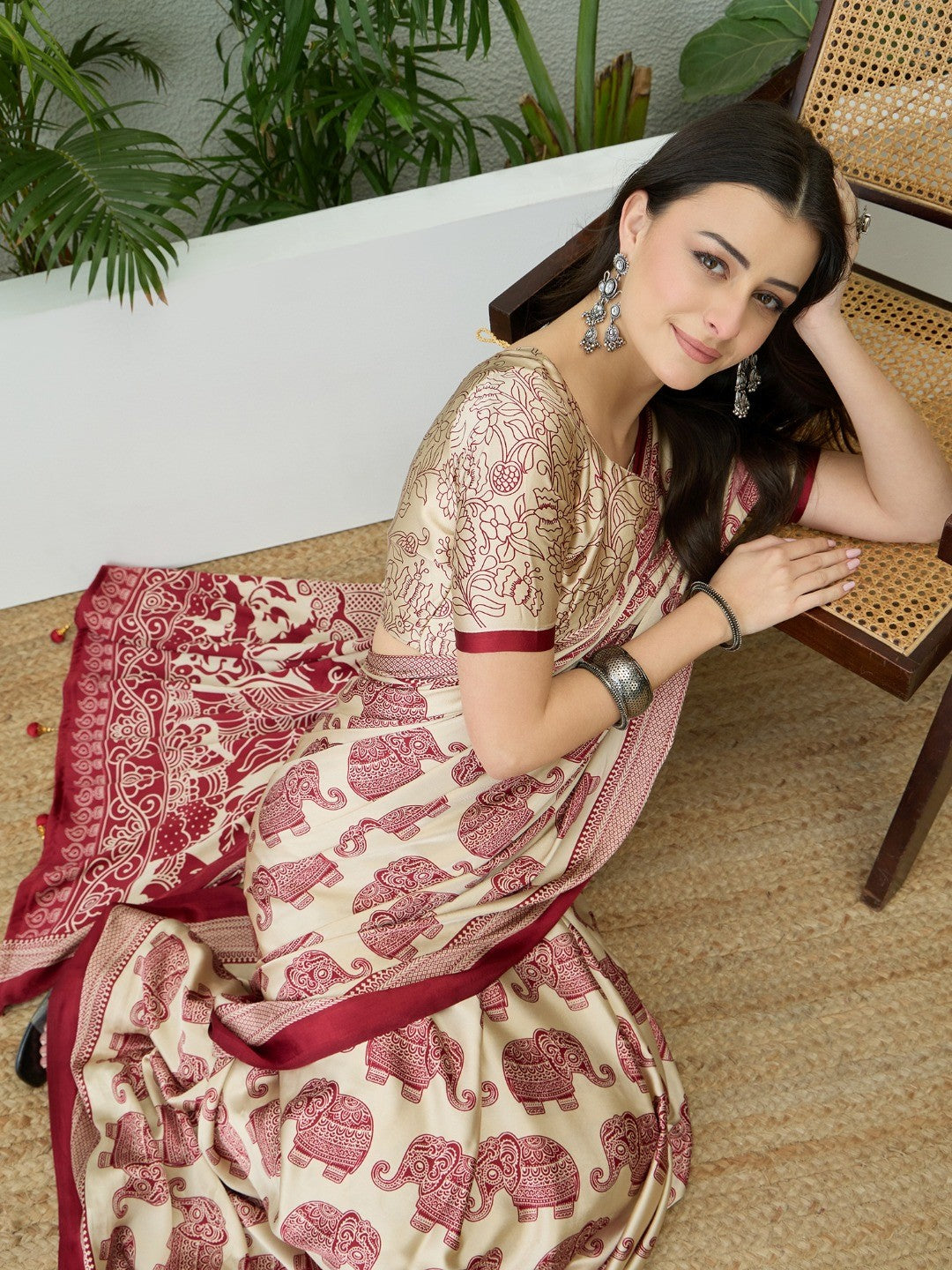 Premium Cream Satin Saree With Artistic Elephant Print And Tassel Pallu Accent - Image 5