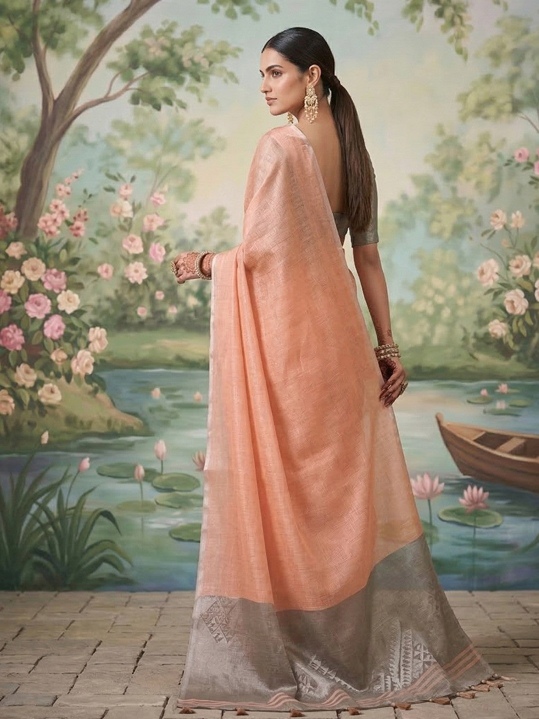 Modern Peach Tissue Saree with Elegant Grey Border and Stylish Tassels - Image 3