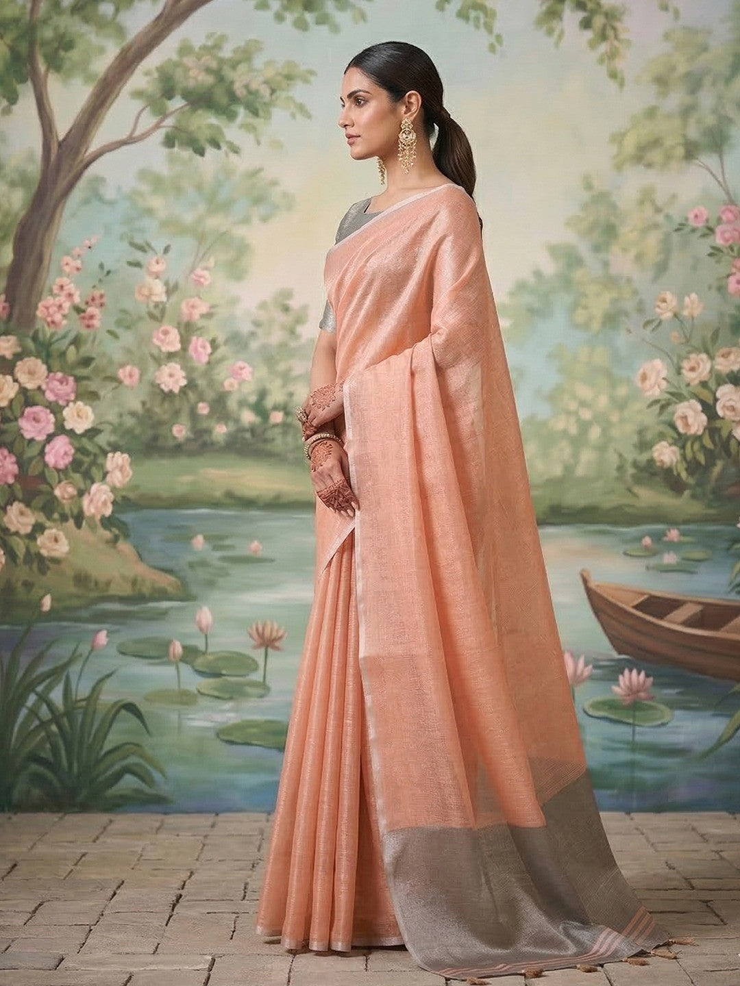 Modern Peach Tissue Saree with Elegant Grey Border and Stylish Tassels - Image 2