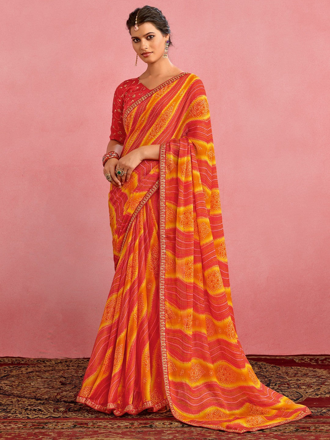 Elegant Red & Yellow Chiffon Saree with Bandhani Print and Embellished Border - Image 1