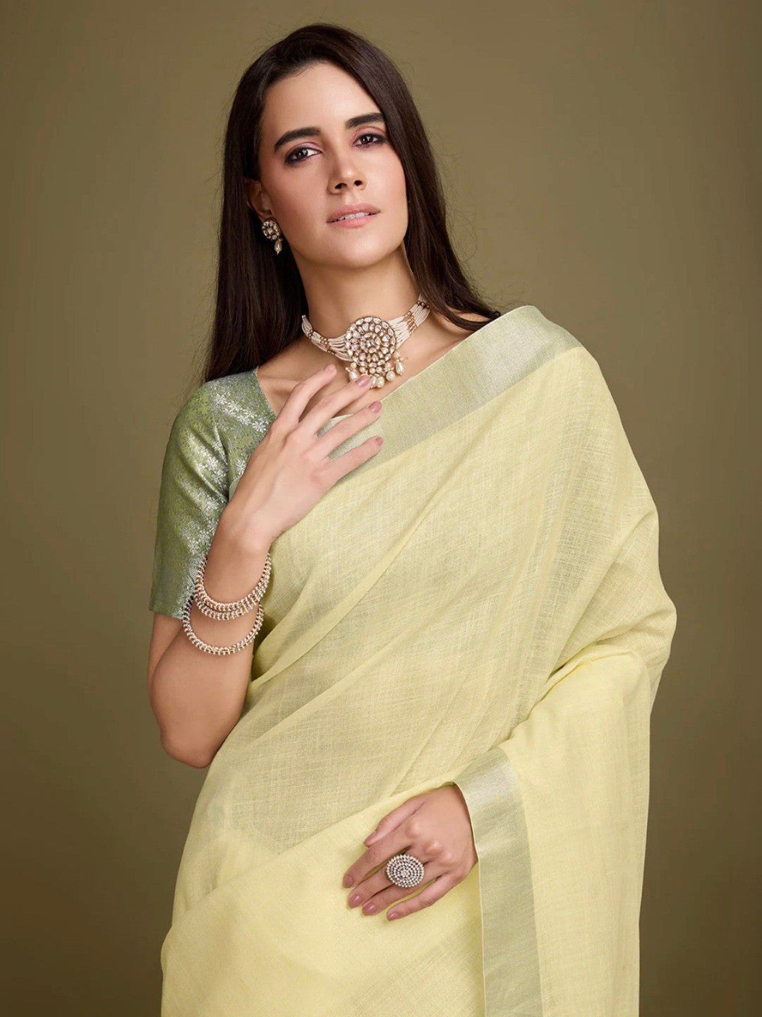 Sophisticated Yellow Linen Saree Featuring Intricate Zari Weaving & Tassel Accents - Image 4