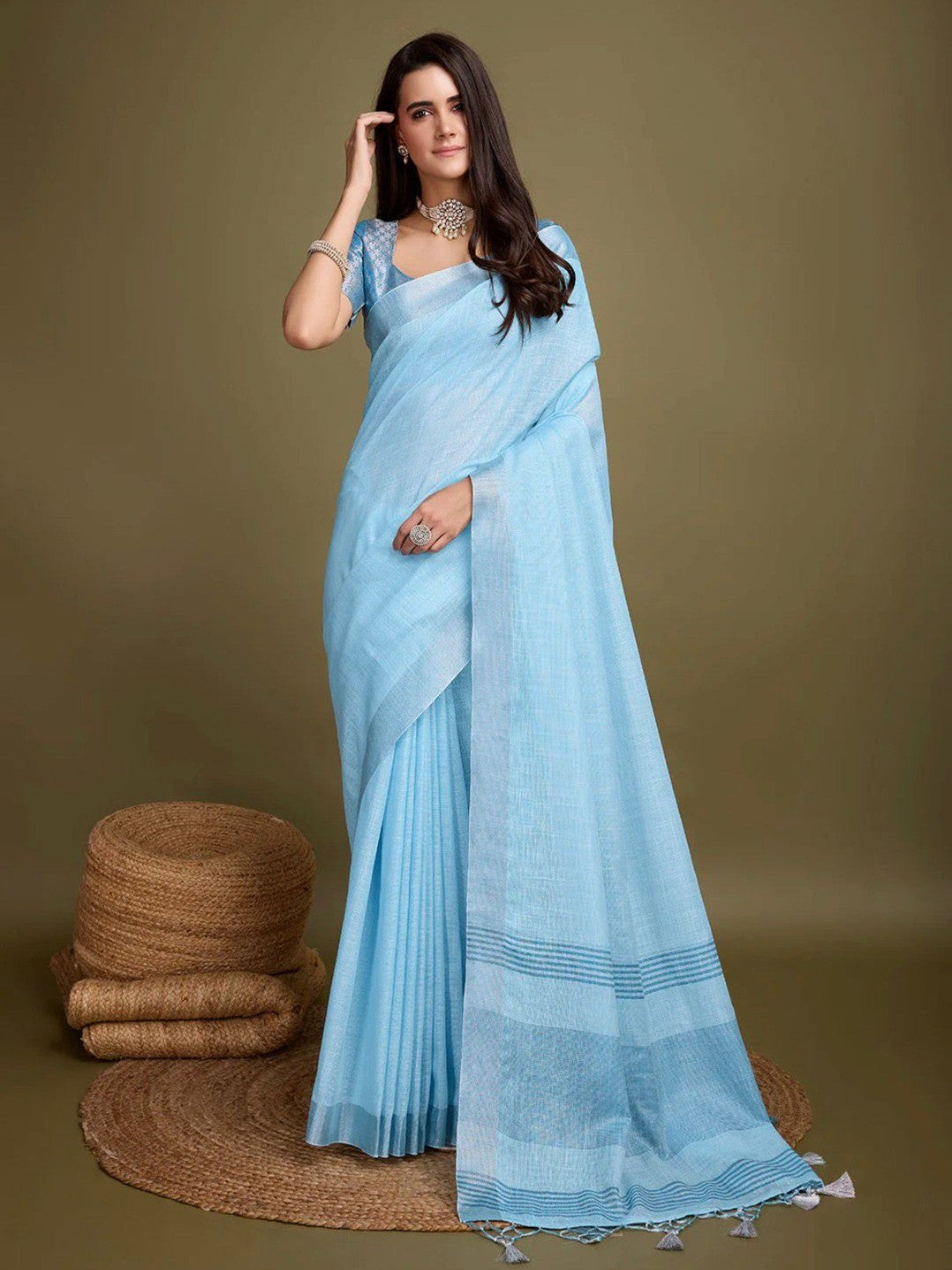 Sophisticated Blue Linen Saree Featuring Intricate Zari Weaving & Tassel Accents - Image 1