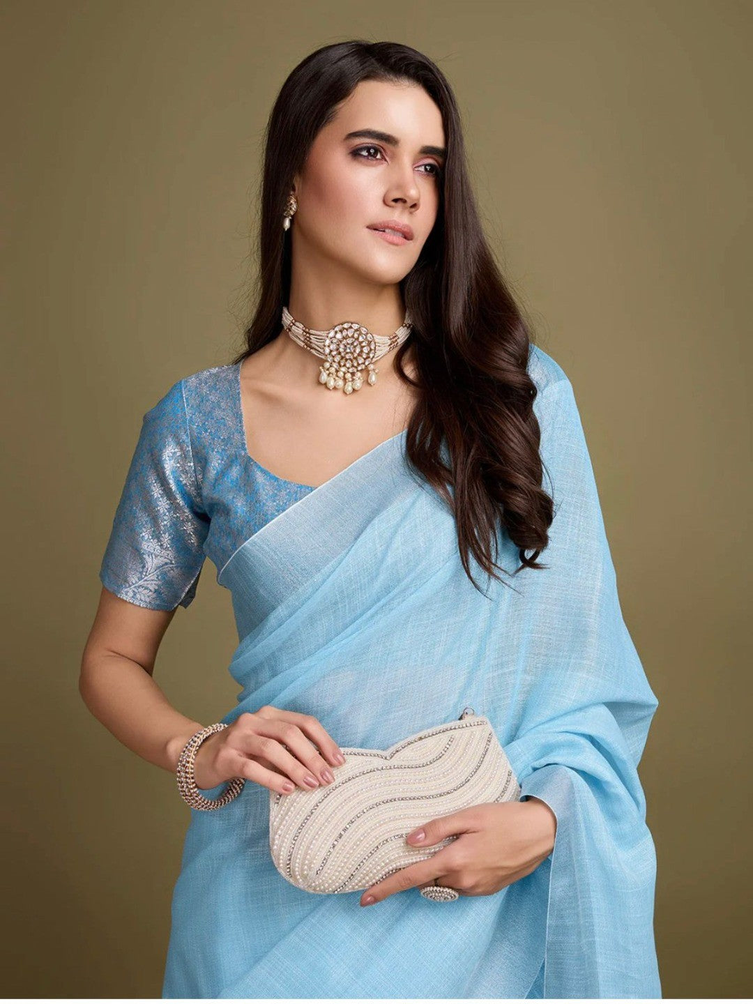 Sophisticated Blue Linen Saree Featuring Intricate Zari Weaving & Tassel Accents - Image 4