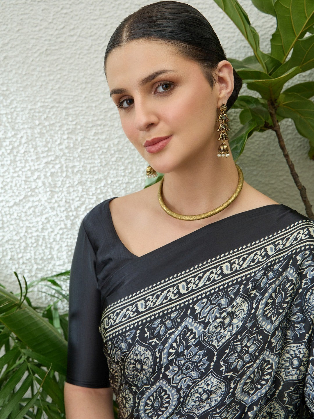 Sophisticated Black Floral Print Satin Saree With Ethnic Latkan Pallu - Image 4