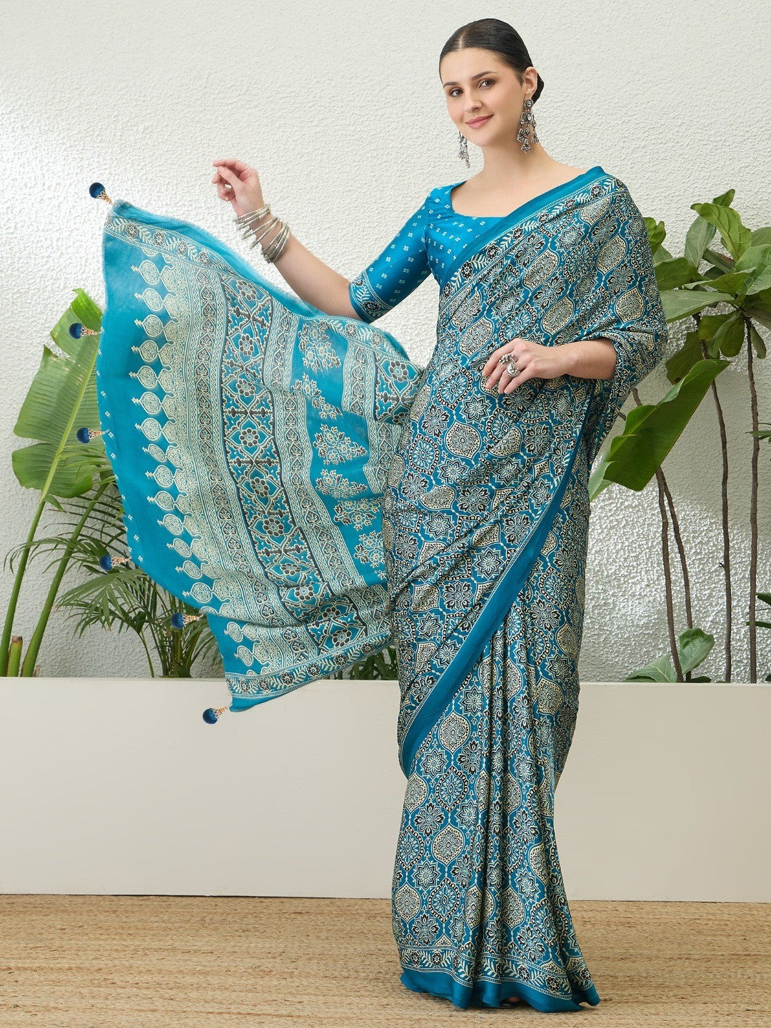 Charming Teal Blue Floral Printed Satin Saree Beautified With Decorative Latkan Pallu - Image 1