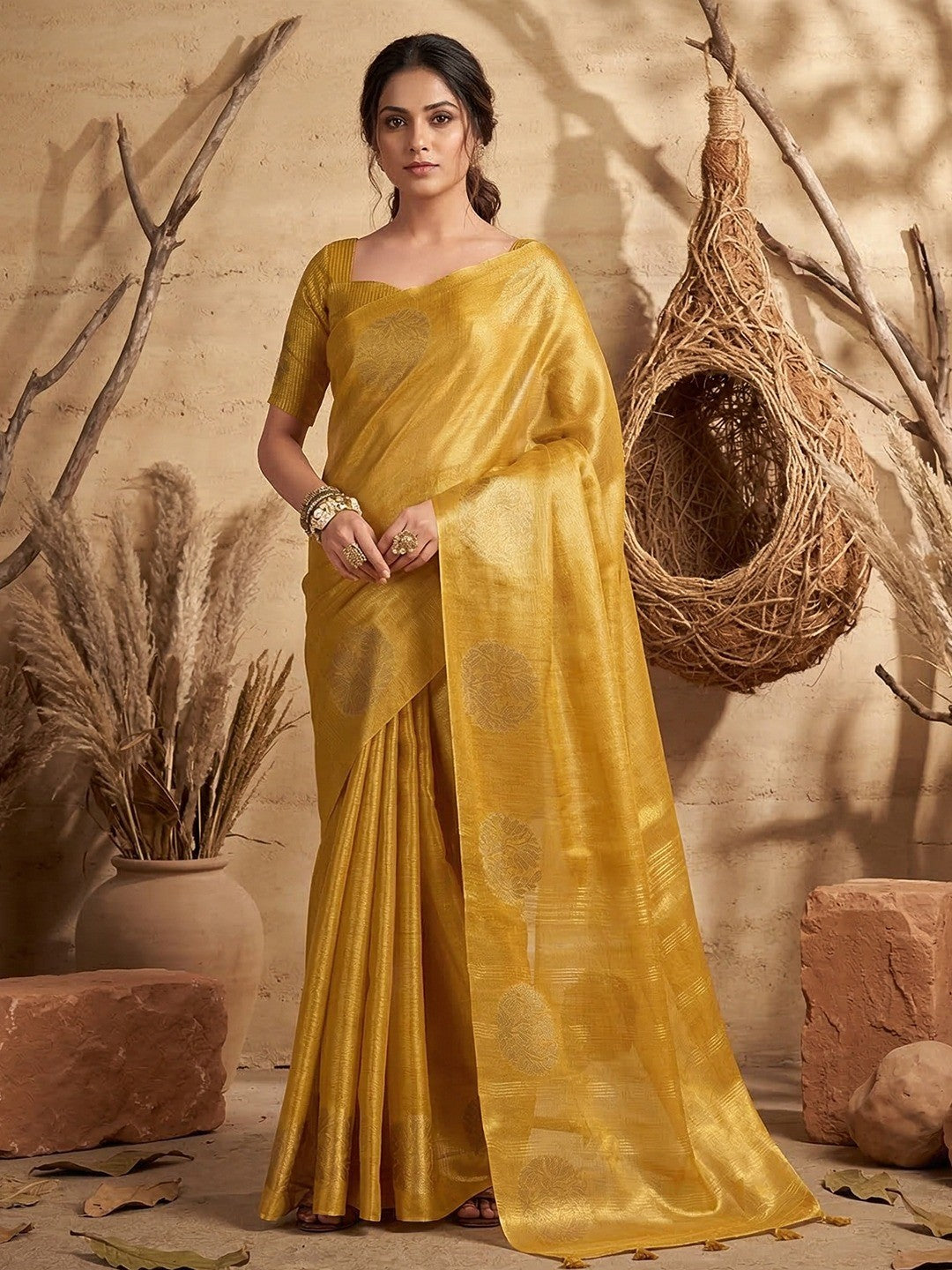 Classic Mustard Floral Zari Weaving Tissue Silk Saree With Tassel Pallu - Image 1