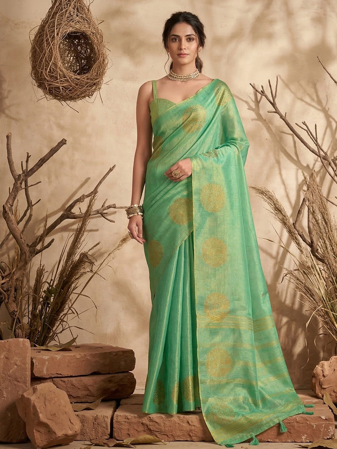 Classic Green Floral Zari Weaving Tissue Silk Saree With Tassel Pallu - Image 1
