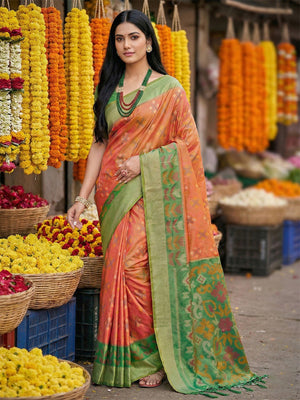Radiant Orange Silk Blend Saree Featuring Intricate Zari Weaving & Tassel Pallu - Image 1