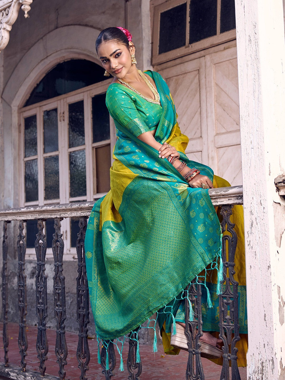 Premium Lemon Yellow Geometric & Animal Motif Weaving Saree With Decorative Tassel Pallu - Image 2