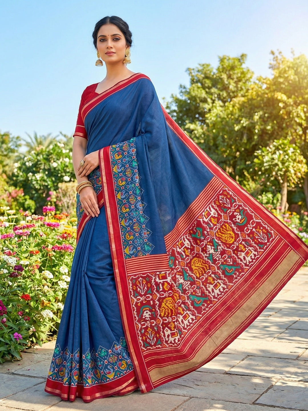 Blue Viscose Saree with Ikkat Printed Border and Graceful Feminine Appeal - Image 1