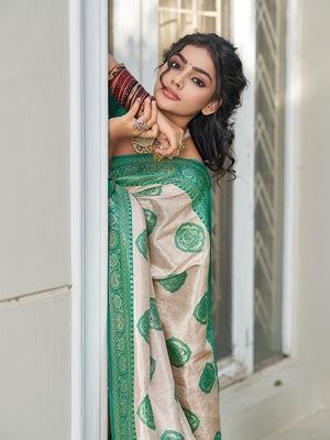 Graceful Cream & Turquoise Floral Weaving Silk Blend Saree Enhanced With Designer Tassel Pallu - Image 2