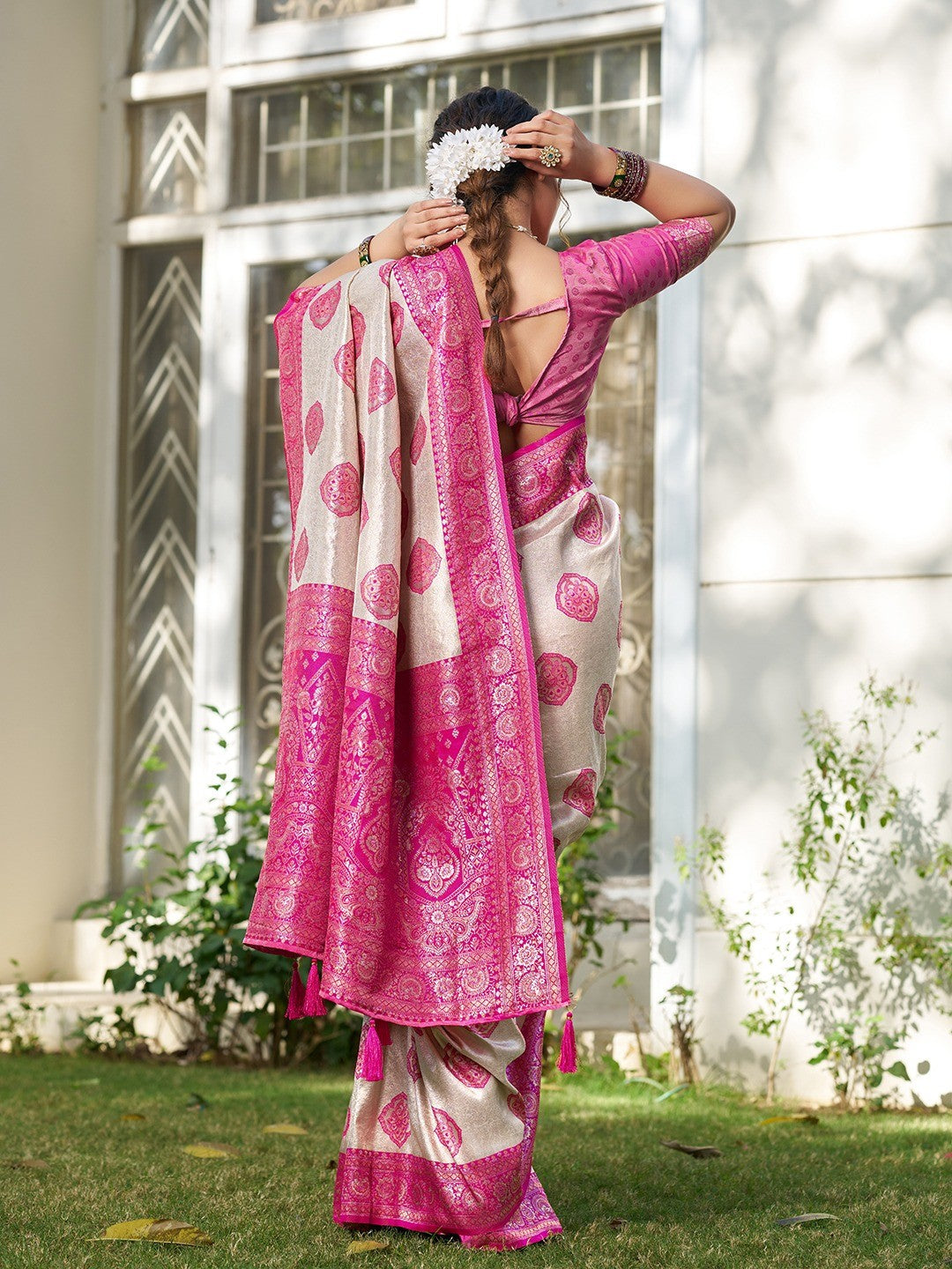 Graceful Cream & Rani Pink Floral Weaving Silk Blend Saree Enhanced With Designer Tassel Pallu - Image 6