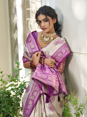 Graceful Cream & Purple Floral Weaving Silk Blend Saree Enhanced With Designer Tassel Pallu - Image 2