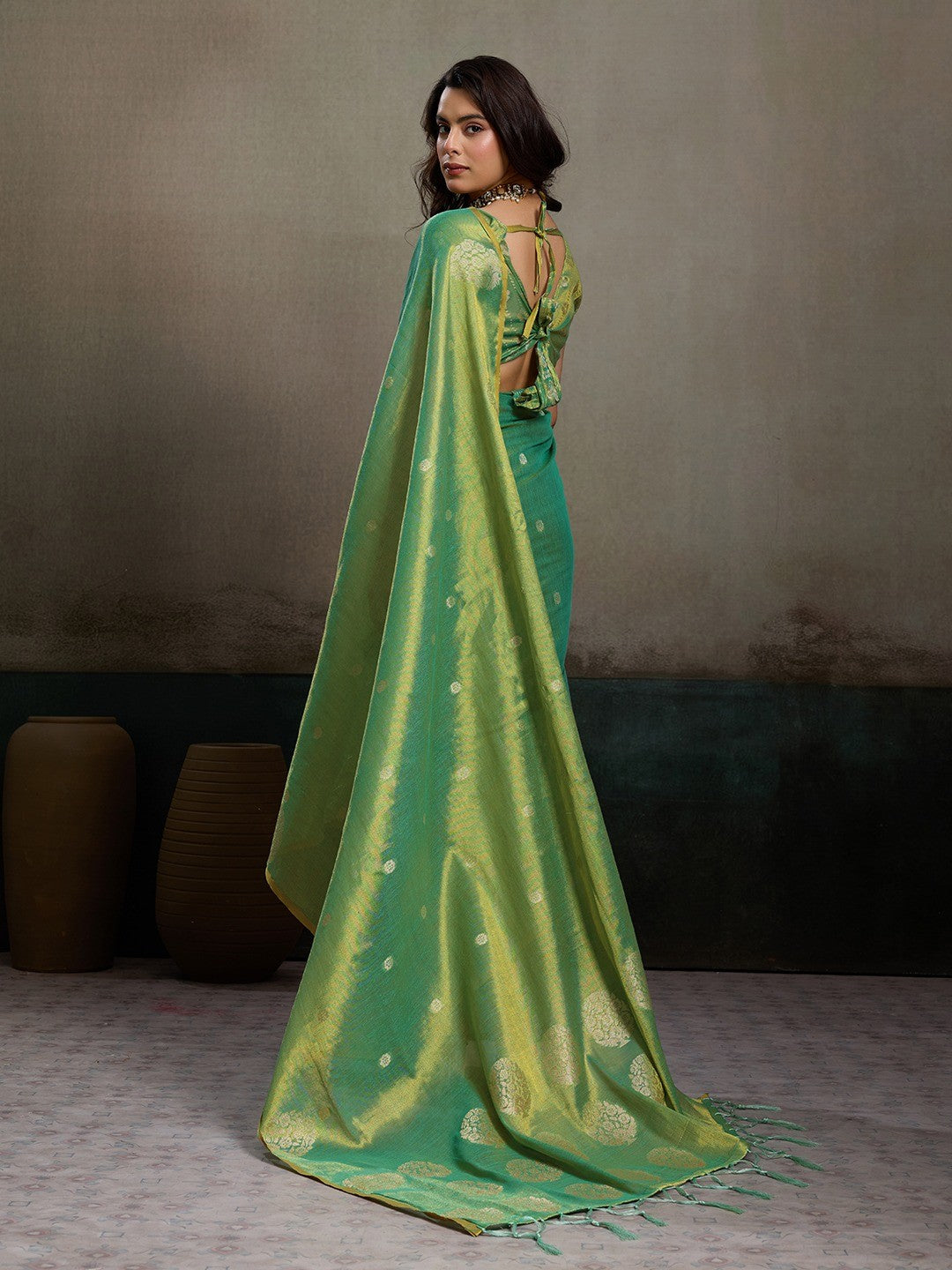 Stylish Green Tissue Saree with Fine Woven Floral Patterns and Glossy Finish - Image 3