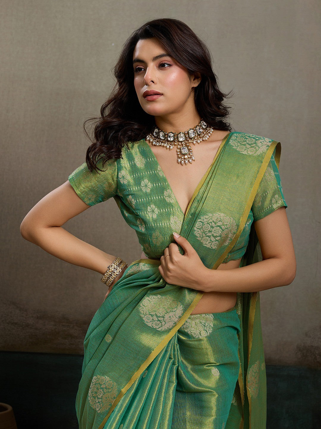 Stylish Green Tissue Saree with Fine Woven Floral Patterns and Glossy Finish - Image 5
