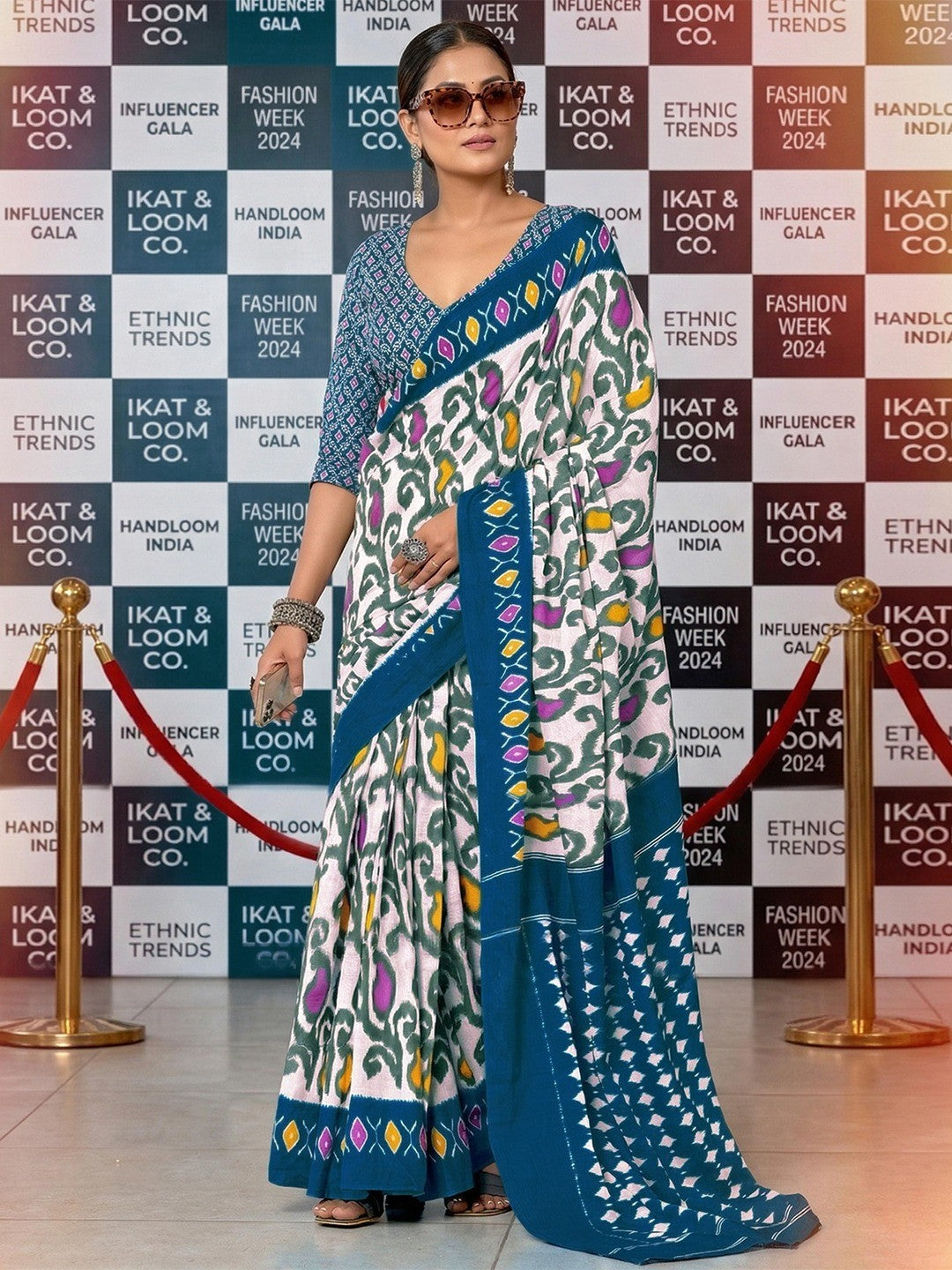 Charming Blue & White Ikkat Printed Mulmul Cotton Saree With Subtle Work - Image 1