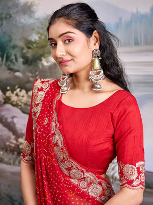 Graceful Red Bandhani Print Georgette Saree Highlighted With Floral Embroidery Work Border - Image 2