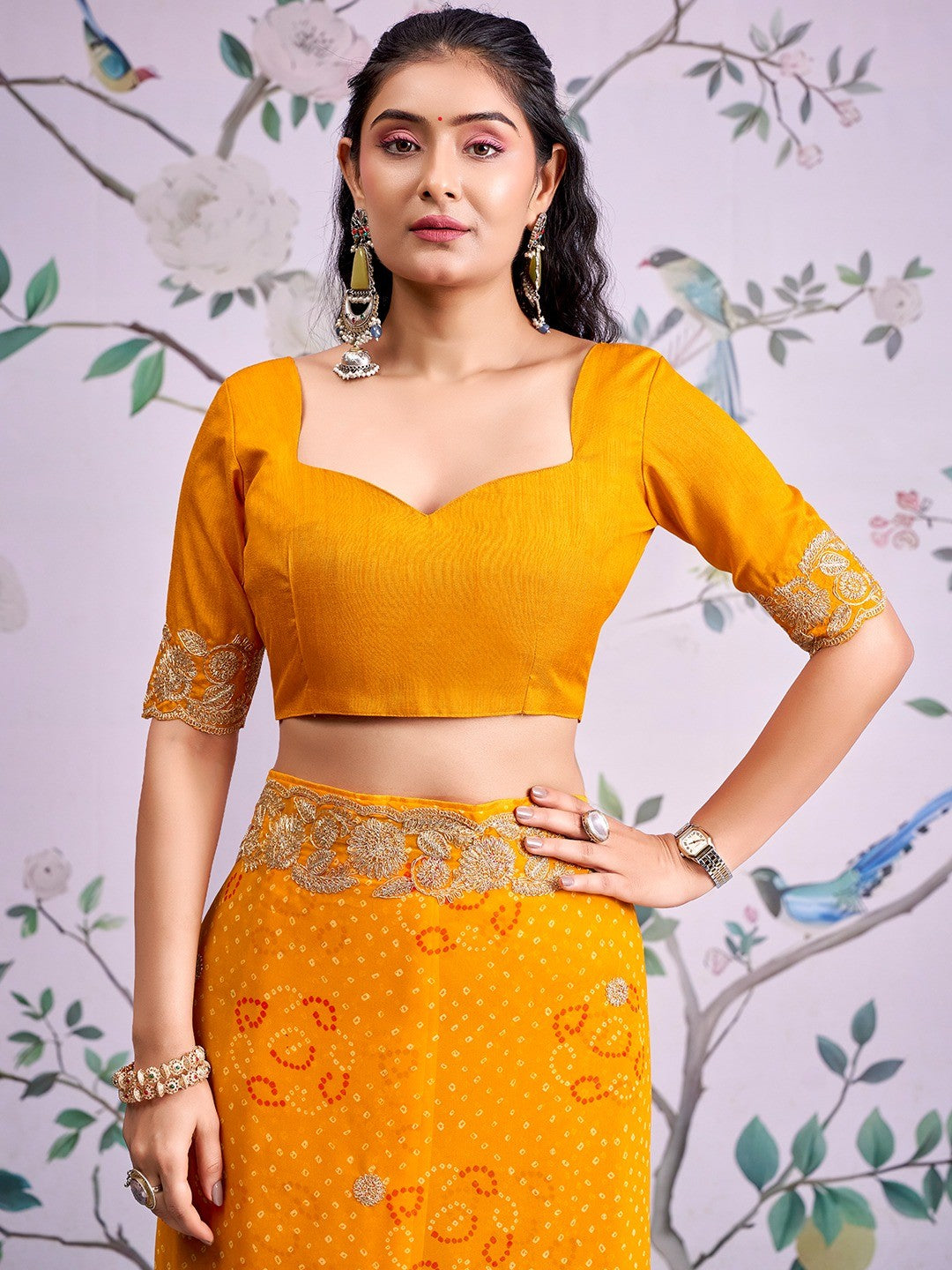 Graceful Mustard Bandhani Print Georgette Saree Highlighted With Floral Embroidery Work Border - Image 4