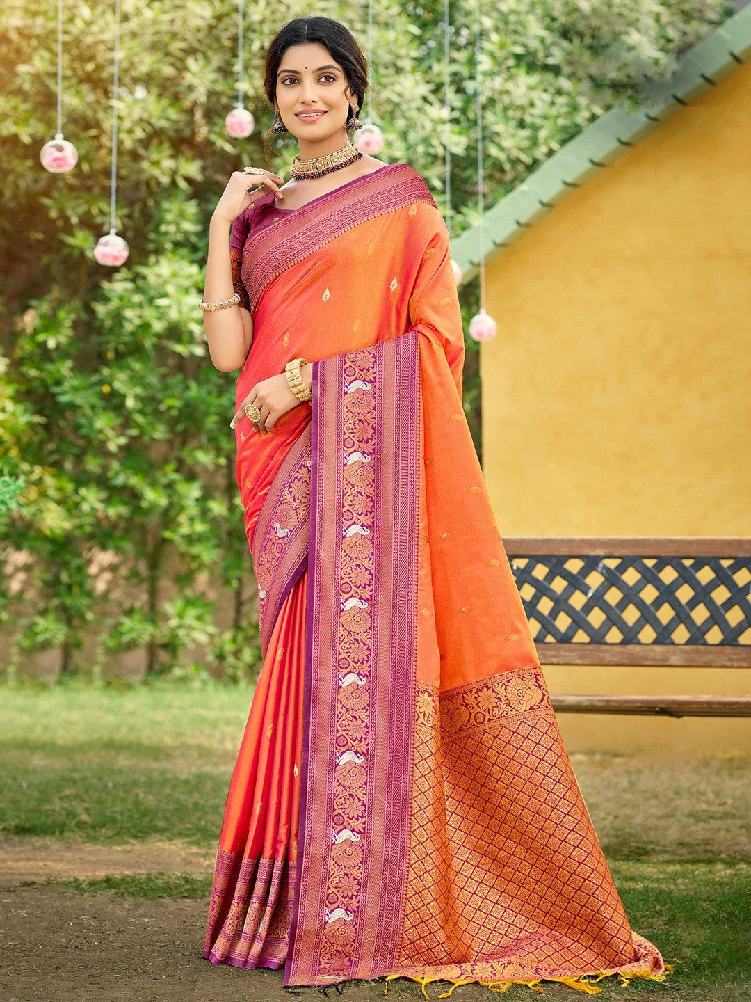 Classic Coral Orange Floral & Peacock Design Zari Woven Silk Blend Saree With Trendy Tassel Pallu - Image 1
