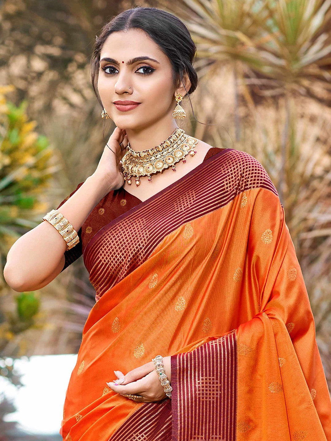 Graceful Orange Zari Woven Silk Blend Saree With Floral Motif Detailing & Elegant Tassels Pallu - Image 5