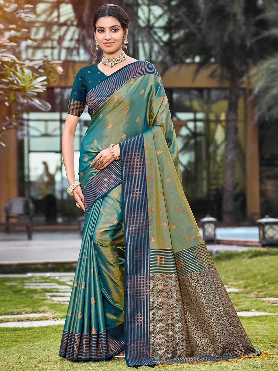 Graceful Rama Green Zari Woven Silk Blend Saree With Floral Motif Detailing & Elegant Tassels Pallu - Image 1