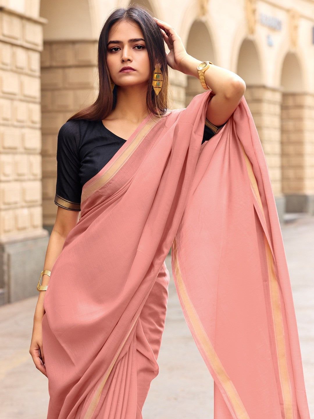 Charming Peach Solid Mulmul Cotton Saree Highlighted By Zari Weaving Border & Tassel Pallu - Image 3