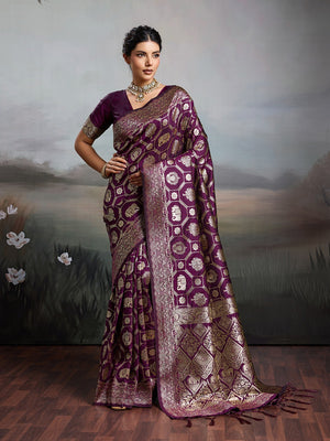 Graceful Wine Floral & Elephant Motif Silk Blend Saree With Zari Weaving & Tassels Pallu - Image 1