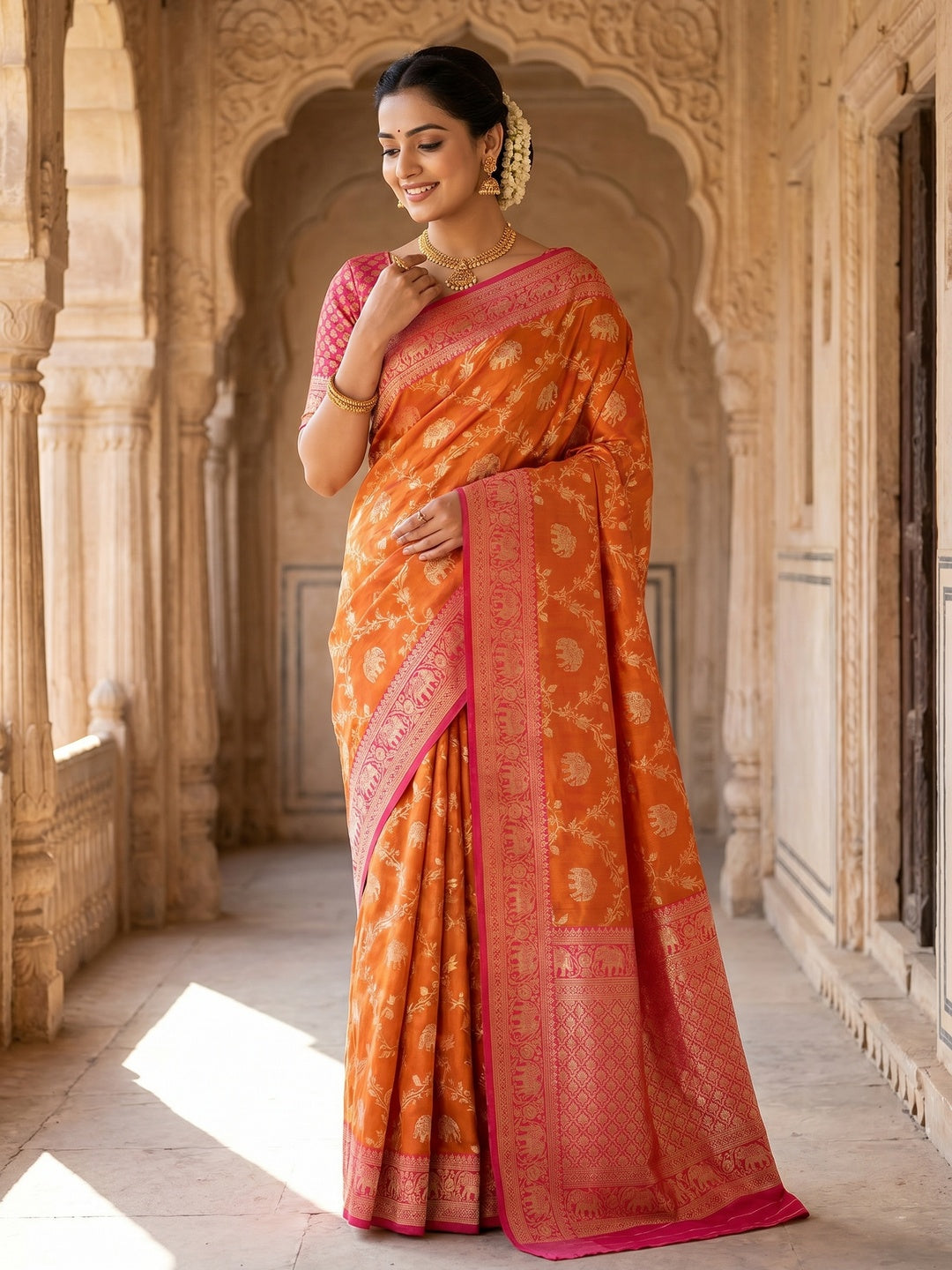 Elegant Orange Silk Blend Woven Zari Saree with Intricate Elephant Motifs - Image 1