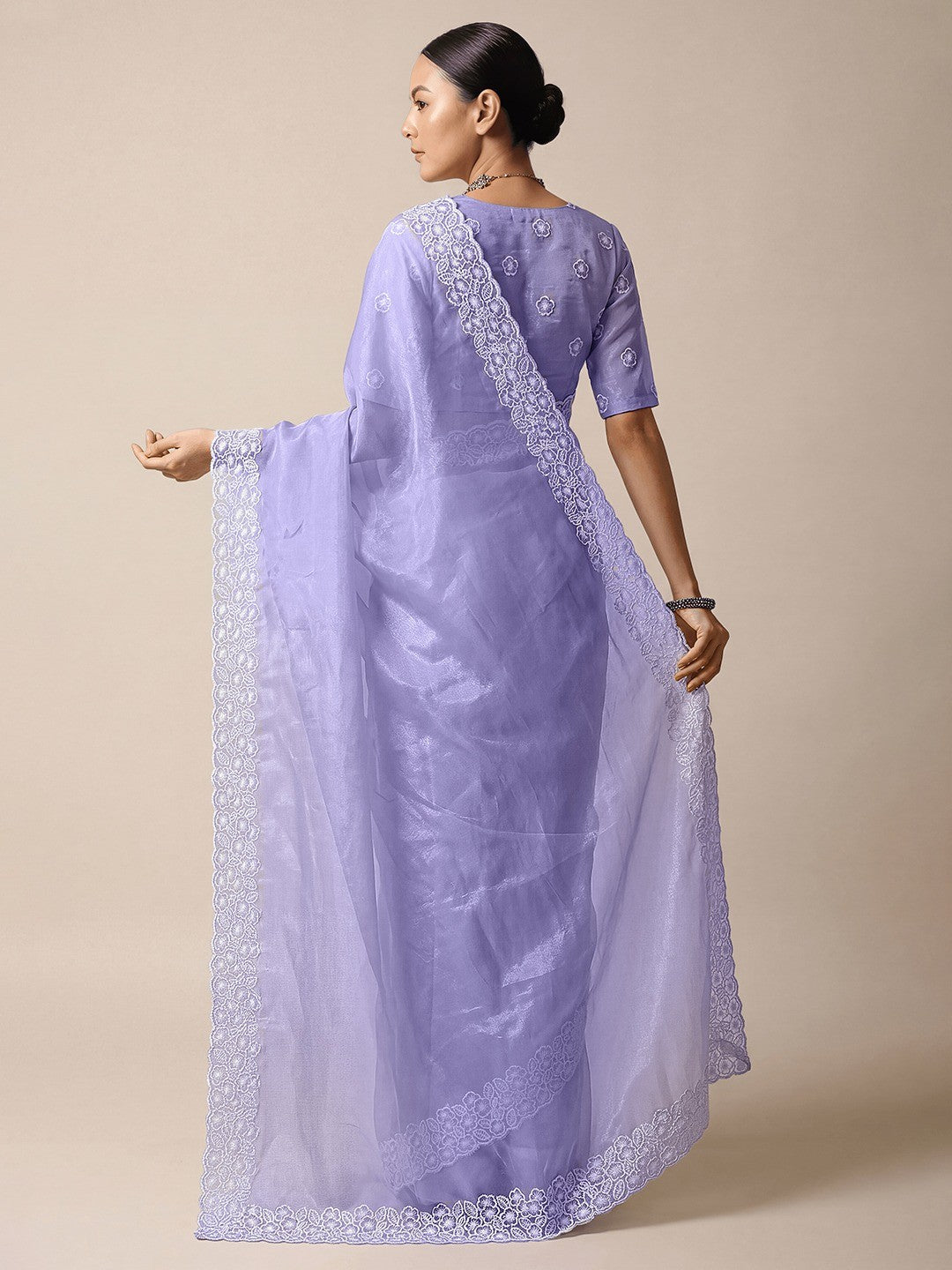 Premium Lavender Solid Twill Net Saree Accentuated With Floral Embroidered Border Detailing - Image 2