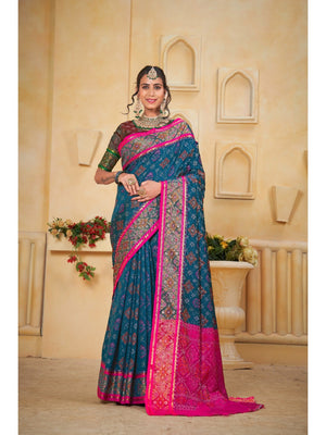 Designer Teal Blue Banarasi Silk Saree With Intricate Patola Zari Weaving & Fancy Border - Image 1