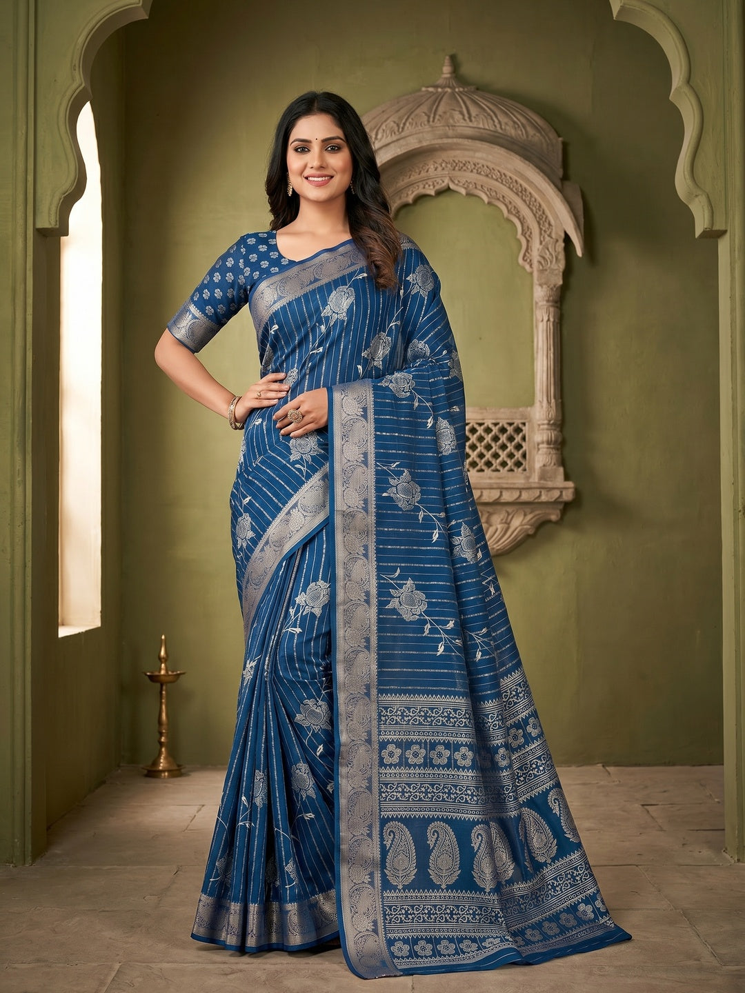 Teal Crepe Saree with Zari Work Floral Pattern and Jaquard Border - Image 1