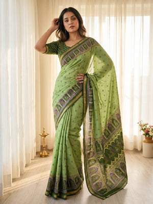 Elegant Green Viscose Saree with Fancy Print and Zari Border - Image 1